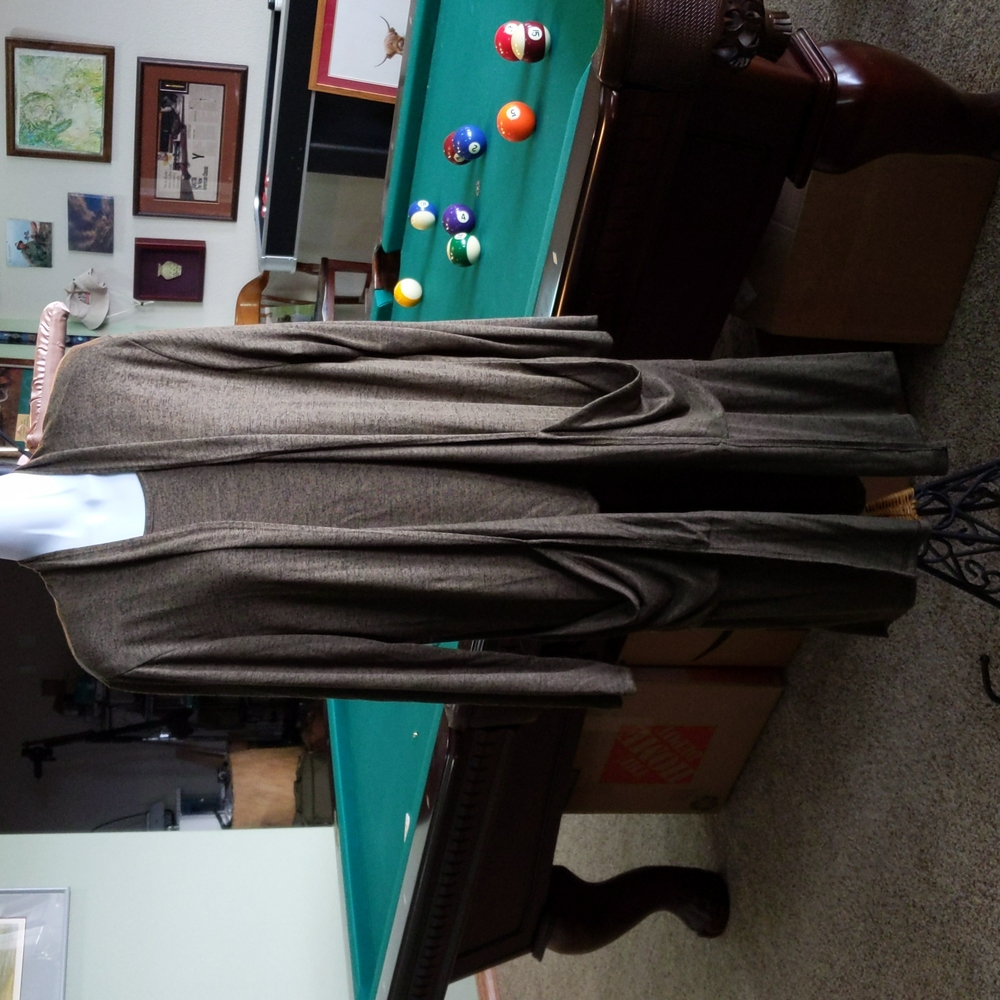Long cardigan with sleeveless top.